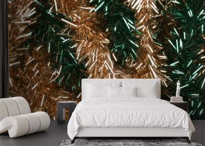 shimmering tinsel garland texture with a blend of metallic forest green, tan and burnt sienna strands Wall mural