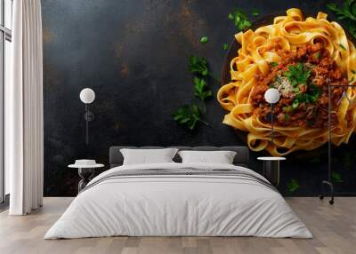 tagliatelle with bolognese sauce with a hearty meat sauce and fresh parsley against an isolated warm-toned background Wall mural