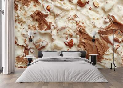 top view of rocky road ice cream surface, a closeup of the rocky road ice cream texture, featuring its rich chocolate base with nuts and marshmallow pieces Wall mural