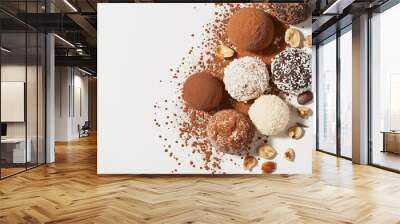 truffles with a variety of cocoa powder, nuts, and coconut coatings against an isolated white background Wall mural