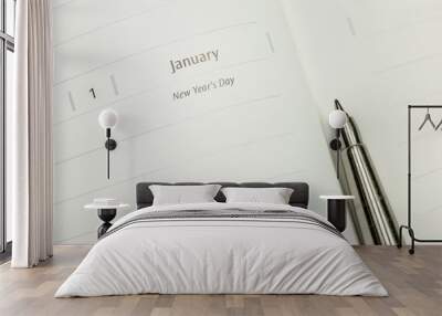 Pen and Organizer book at New Year's Day page Wall mural