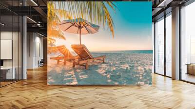 Amazing sunset beach. Romantic couple chairs umbrella sun rays. Tranquil togetherness love wellbeing, relax beautiful landscape. Getaway tropical island coast palm leaves idyllic sea. Dream travel Wall mural