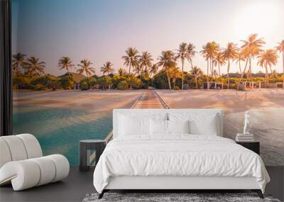 Amazing sunset panorama at Maldives. Luxury resort villas seascape with soft led lights under colorful sky. Beautiful twilight sky and colorful clouds. Beautiful beach background for vacation holiday Wall mural