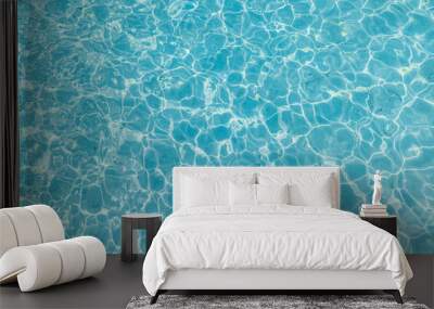 Blue ripped sea water as swimming pool. Crystal clear ocean lagoon bay turquoise blue azure water surface, closeup natural environment. Tropical Mediterranean beach water background Wall mural