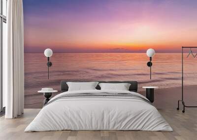 Closeup sea sand beach. Panoramic beach landscape. Inspire tropical beach seascape horizon. Purple gold sunset sky peaceful tranquil relaxing sunlight summer mood. Vacation coast travel holiday banner Wall mural