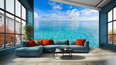 Crystal clear sea water bay. Pristine ocean lagoon sunny cloudy sky, idyllic relaxing seascape. Transparent surface, exotic travel. tropics Mediterranean nature panorama. Summer background, beach view Wall mural