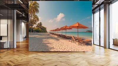 Fantastic panoramic view. Sandy shore soft sunrise sunlight over chairs umbrella and palm trees. Tropical island beach landscape exotic coast. Summer vacation, holiday. Relaxing sunrise leisure resort Wall mural