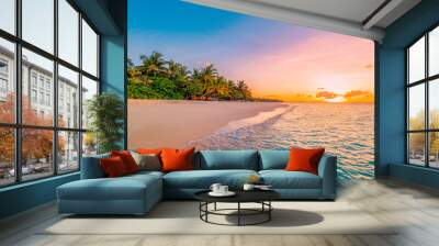 Landscape of paradise tropical island beach. Silhouette of palm trees beautiful sunset sky, dream sea beach background for travel in holiday relax tourism. Closeup view of waves sunrise seaside nature Wall mural