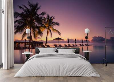 Luxury poolside on the beach with sunset colors. Amazing luxury summer background Wall mural