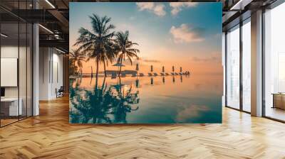 Luxury summer travel and vacation. Beautiful poolside and sunset sky landscape. Luxurious tropical beach landscape, deck chairs and loungers and water reflection. Wall mural