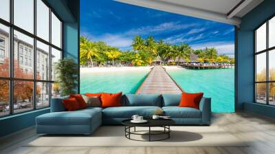 Maldives paradise beach. Perfect tropical island. Beautiful palm trees and tropical beach. Moody blue sky and blue lagoon. Luxury travel summer holiday background concept. Wall mural