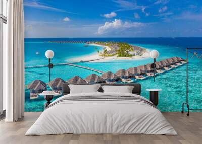 Maldives paradise scenery. Tropical aerial landscape, seascape with long jetty, water villas with amazing sea and lagoon beach, tropical nature. Exotic tourism destination banner, summer vacation Wall mural