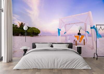 Romantic beach dinner. Sunset beach scene Wall mural