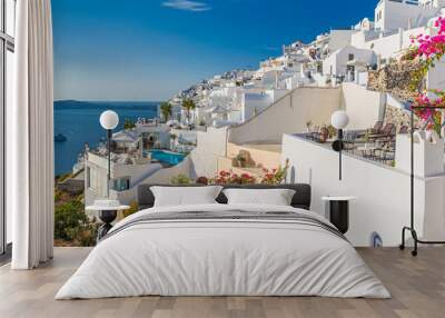 Summer vacation panorama, luxury famous Europe destination. White architecture in Santorini island, Greece. Travel landscape cityscape with pink flowers, stairs, caldera view in sunlight and blue sky Wall mural