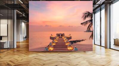 Tranquil sunset panorama at Maldives. Luxury resort pier seascape with candles lights under colorful sky. Beautiful romantic destination dining setting couple honeymoon, love vacation holiday panorama Wall mural