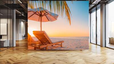 Tranquil tropical sunset scenery couple sun bed loungers, umbrella palm tree leaves. White sand sea view horizon, colorful twilight sky, calmness relaxation. Luxury vacation travel beach resort hotel Wall mural