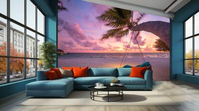 Tropical sunset beach background as summer landscape panorama with beach swing or hammock and white sand and calm sea beach banner. Perfect beach scene vacation or summer holiday concept Wall mural