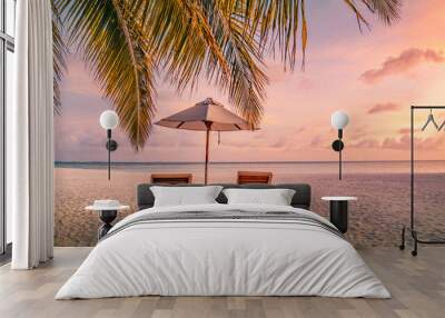 Tropical sunset beach panorama as summer relax landscape. Swing on coconut palm tree hanging over sandy coast calm sea, carefree beach. Amazing panoramic summer vacation. Sun rays seascape relax sky Wall mural