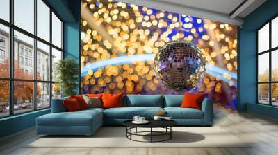 Christmas disco ball decorating on branch fir of Christmas tree and Christmas ornament. Wall mural