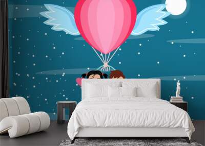 Happy cute kid boy and girl character flying with hot air hart shape valentine balloon with wings and waving with hart shape symbol on sky background  Wall mural