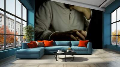 Concept of internet addiction, man on laptop at night Wall mural