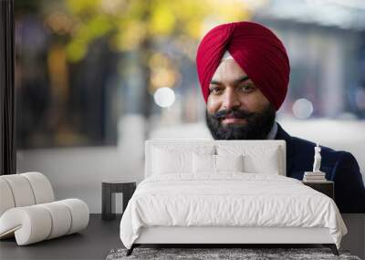 Portrait of Sikh business man looking to camera in the city Wall mural