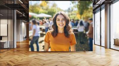 portrait of an attractive woman laughing in a crowd at a music festival Wall mural