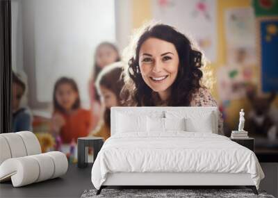 smiling  preschool teacher in classroom Wall mural