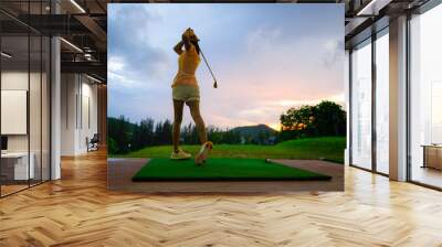 woman driving practice golf training for a better hit in course, practice for winning competitive Wall mural