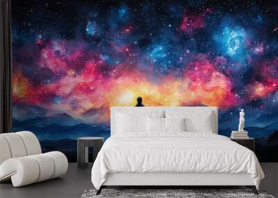 A lone figure stands on a mountaintop, silhouetted against a vibrant night sky filled with stars and nebulas. The scene evokes feelings of wonder, exploration, and the vastness of the universe. Wall mural