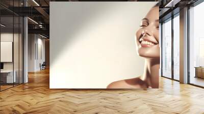 Close up portrait of a beautiful young woman on a light gray background. Natural Beauties with fresh and clean skin for glowing healthy skin care promotion, with copy space Wall mural