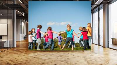 Group of Girls Holding Hands in a Circle Outside - Unity, Friendship Wall mural