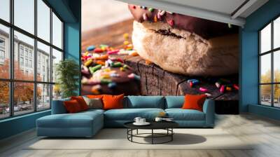 chocolate donuts with colorful sprinkles Wall mural