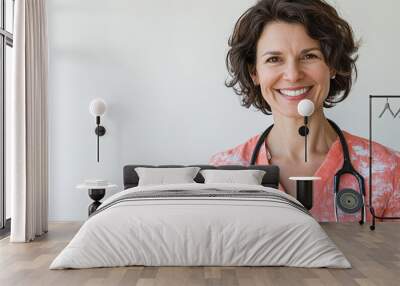 Happy female doctor with stethoscope on white background Wall mural