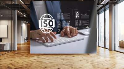 Digital ISO certification and compliance management, Business professional managing ISO certification and compliance using digital tools, focusing on quality assurance and documentation processes. Wall mural