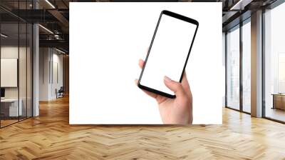 User holding modern smartphone with white screen in hand isolated on a white background Wall mural