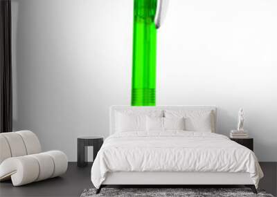 Green and silver pen isolated on white Wall mural