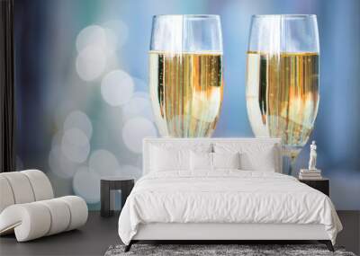 Two champagne glass on christmas bokeh background Wall mural