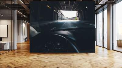 Driver POV personal perspective including the electronic dashboard with 92kmh steering wheel and the front driving cars exiting the tunnel of Boulevard peripherique in Paris, France Wall mural