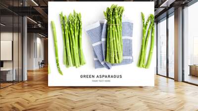 Fresh green asparagus creative layout isolated on white background. Wall mural