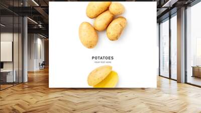 Raw new potatoes pile top view isolated on white background. Wall mural