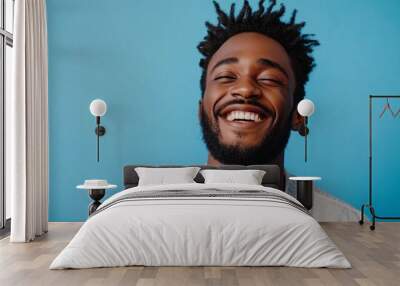 Portrait of a happy handsome man in a shirt with laughing Wall mural