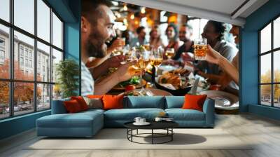 Group of people enjoying a meal together at a restaurant, sitting around a table filled with food and drinks, A group of friends enjoying a meal together at a restaurant Wall mural