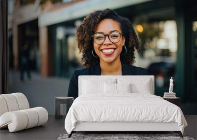 Portrait of a smiling african american businesswoman wearing glasses outdoors, African american woman wearing glasses and a suit standing in front of a building with a smile , AI Generated Wall mural