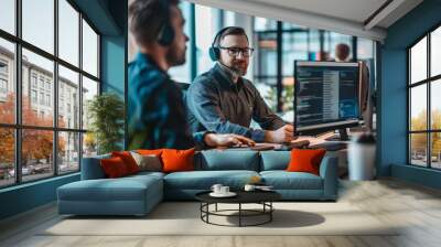 Two men sitting at a desk, discussing cybersecurity strategies on a computer, A cybersecurity consultant advising a company on best practices Wall mural