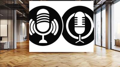 Two stylized black and white microphone icons illustrating sound recording and communication in a modern context Wall mural