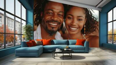 The couple, smiling and having fun, enjoyed coffee at the restaurant. Wall mural