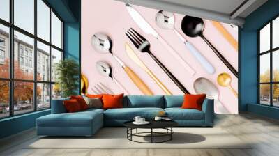 .Collection of various cutlery on pastel background, flat lay, top view,. Wall mural