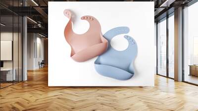 Brown and blue silicone baby bib isolated on white background Wall mural