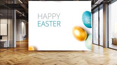 Happy Easter card. Frame  with gold and blue easter eggs with copy space for text. isolated on white background Wall mural